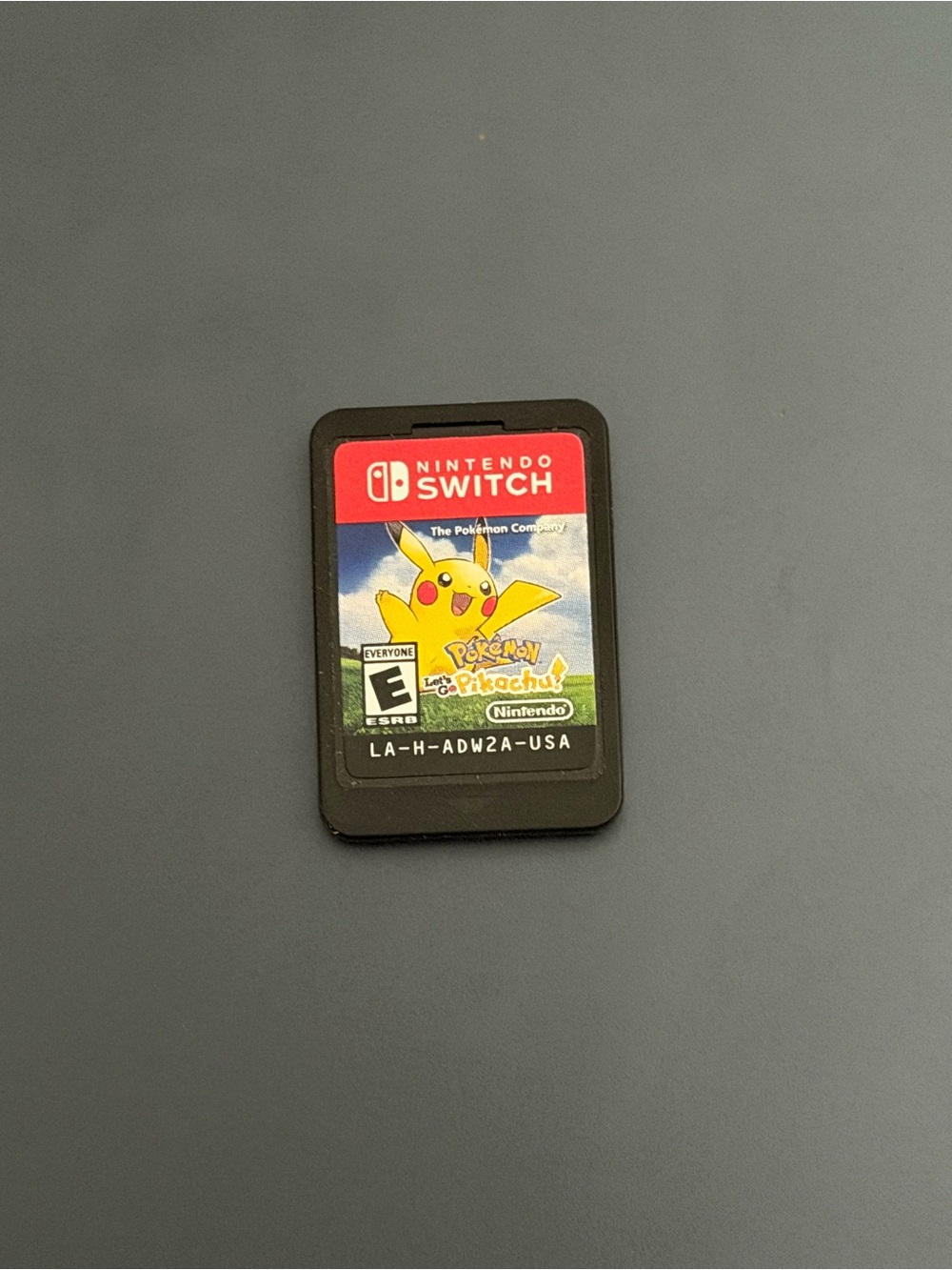 Nintendo Switch Pokémon: Let's Go, Pikachu! Game Card - Black/Red Label